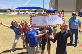 Charter school students with class sign